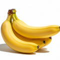 Three yellow bananas on a white background